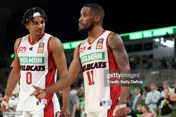 Bryce Cotton of the Wildcats and Tai Webster of the Wildcats react after the win during the NBL Play In match between South East Melbourne Phoenix...