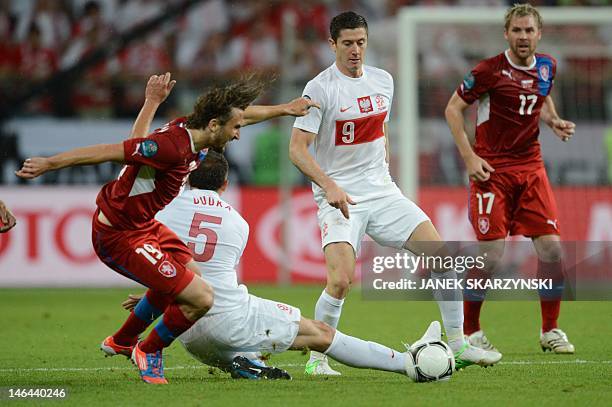 Czech midfielder Petr Jiracek vies with Polish midfielder Dariusz Dudka during the Euro 2012 championships football match between the Czech Republic...