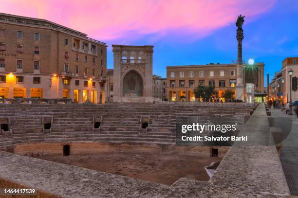 lecce amphitheatre at sunset, italy - lecce stock pictures, royalty-free photos & images