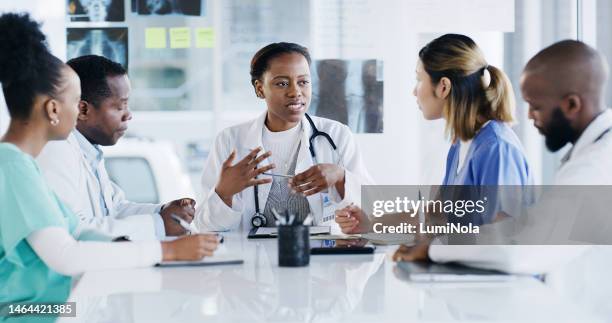 doctor, meeting and planning discussion for healthcare idea or team brainstorming in boardroom. group of medical doctors in teamwork collaboration for surgery schedule or strategy at the hospital - institutional stock pictures, royalty-free photos & images