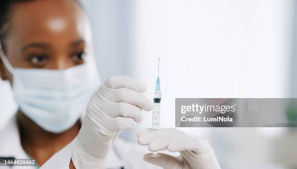 injection, woman and doctor hands holding medicine for safety, flu shot and healthy results in hospital. closeup of needle, medical treatment and covid vaccine for healthcare, nurse or clinic service - vaccine development stock pictures, royalty-free photos & images