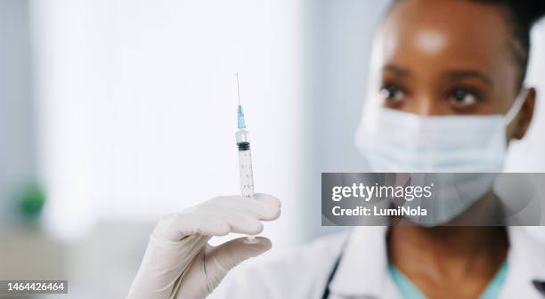 syringe, woman and doctor hands holding medicine for safety, flu shot and healthy results in hospital. closeup of needle, medical treatment and covid vaccine for healthcare, nurse or clinic service - needle stock pictures, royalty-free photos & images