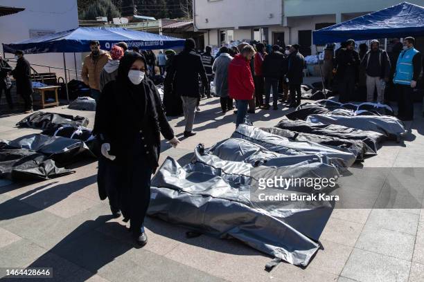 Body bags lie on the floor in a cemetery morgue on February 09, 2023 in Hatay, Turkey. A 7.8-magnitude earthquake hit near Gaziantep, Turkey, in the...