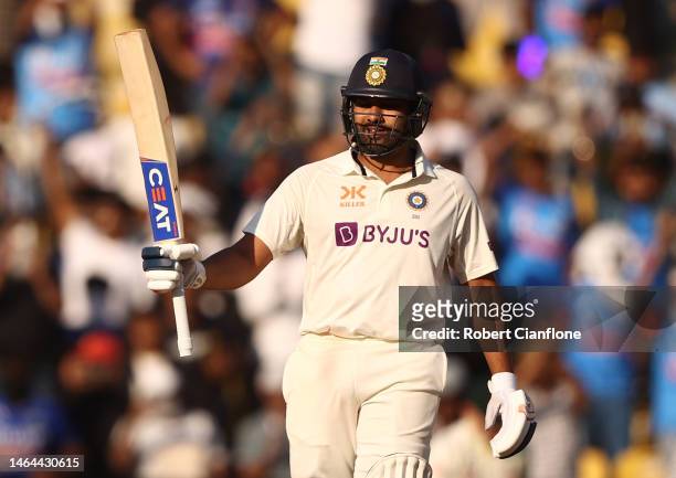 Rohit Sharma of India celebrates after scoring his half century during day one of the First Test match in the series between India and Australia at...