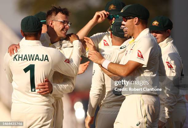 Todd Murphy of Australia celebrates taking the wicket of KL Rahul of India of India during day one of the First Test match in the series between...