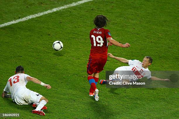 Petr Jiracek of Czech Republic scores their first goal past Marcin Wasilewski and Rafal Murawski of Poland during the UEFA EURO 2012 group A match...