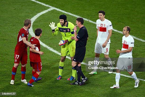 Petr Cech of Czech Republic clashes with Vaclav Pilar of Czech Republic during the UEFA EURO 2012 group A match between Czech Republic and Poland at...