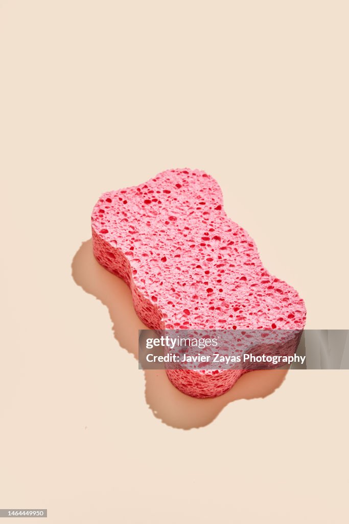 Pink Sponge On Beige Background