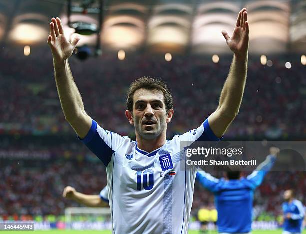 Giorgos Karagounis of Greece celebrates victory and progress to the quarter finals during the UEFA EURO 2012 group A match between Greece and Russia...