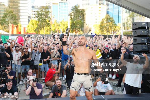 Alexander Volkanovski takes a selfie with fans during the UFC 284 Open Workouts at Elizabeth Quay - The Landing on February 9, 2023 in Perth,...