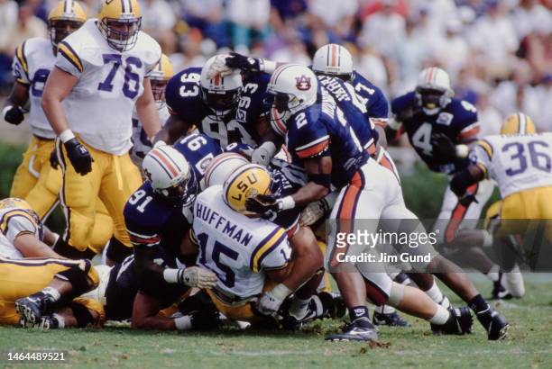 Ryan Huffman, Quarterback for the Louisiana State University Fighting Tigers is tackled and sacked by the Auburn defensive line during the NCAA...