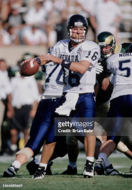 Eric Bennett, Quarterback for the University of Nevada Wolf Pack prepares to throw a pass downfield during the NCAA Western Athletic Conference...
