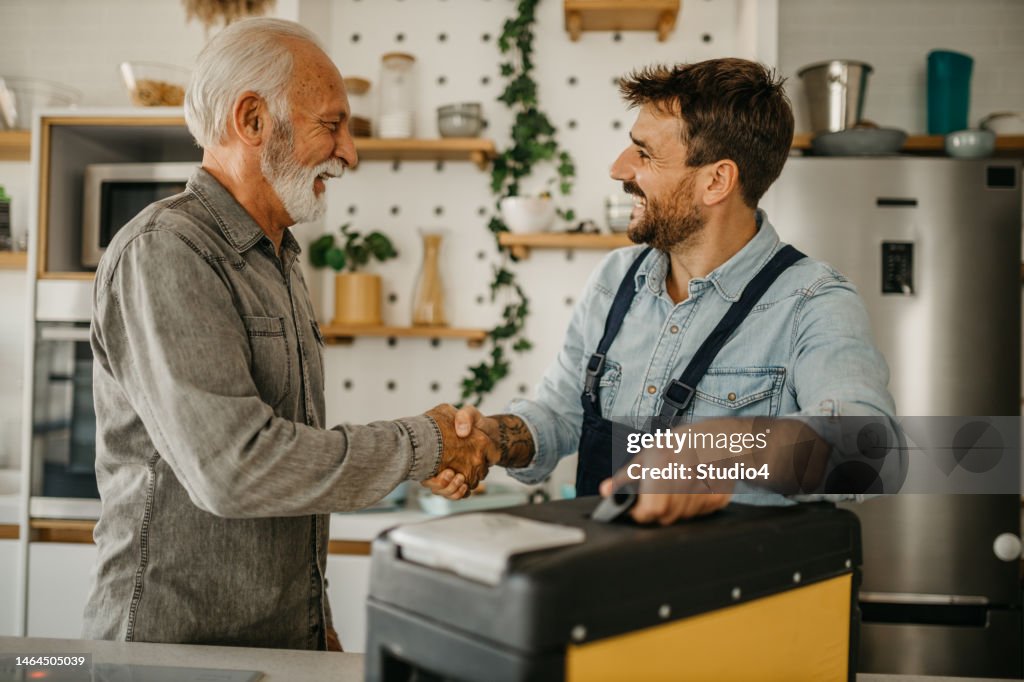Customer welcoming repairman