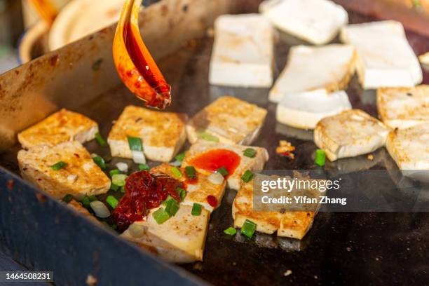 fried stinky tofu with dipping sauce - tofu stock pictures, royalty-free photos & images