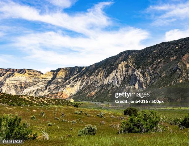 scenic view of field against sky,dinosaur national monument,united states,usa - dinosaur national monument stock pictures, royalty-free photos & images