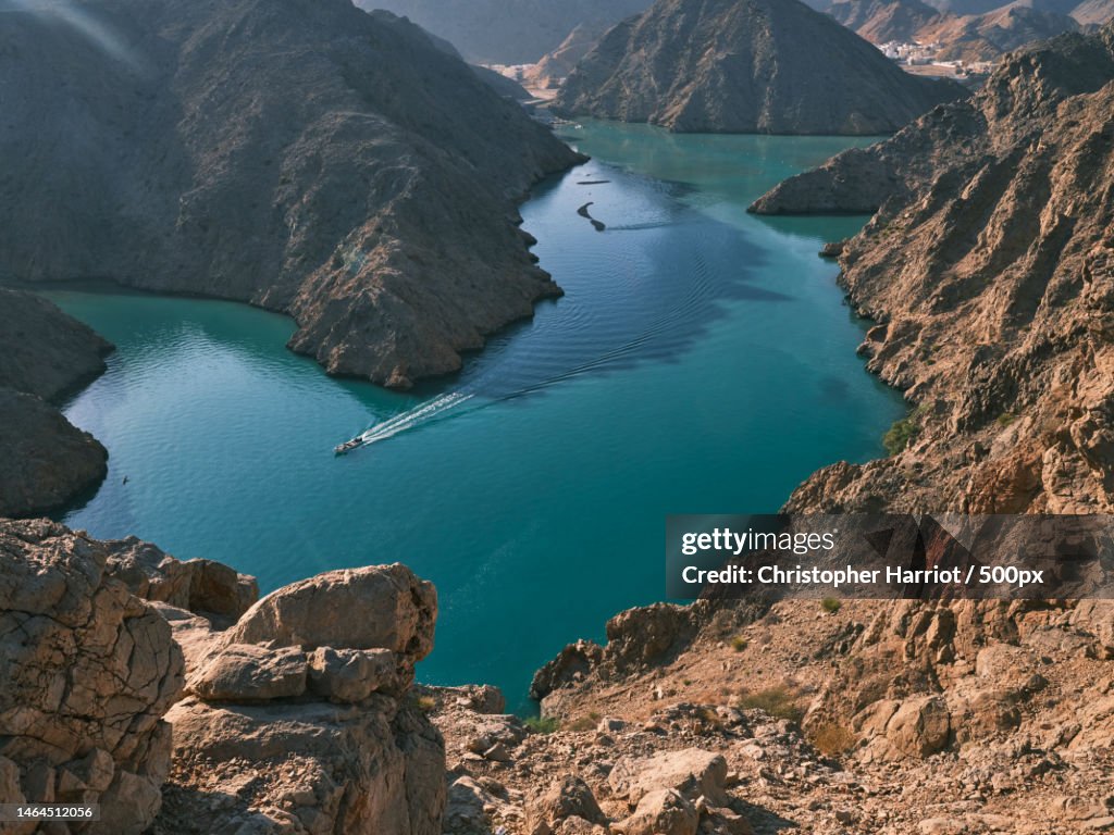 High angle view of lake and mountains,Yenkit,Oman