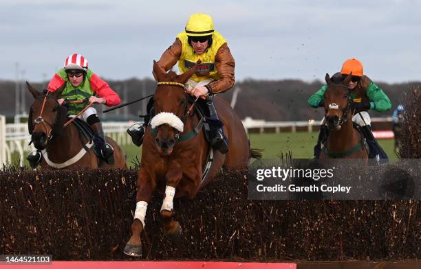 Heroique De Maulde ridden by Brian Hughes jumps the last to win the Virgin Bet Fives Handicap Chase at Doncaster Racecourse on February 09, 2023 in...
