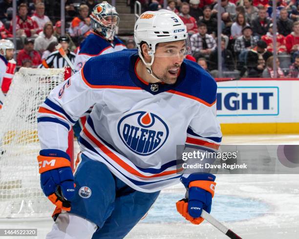 Cody Ceci of the Edmonton Oilers turns up ice against the Detroit Red Wings during the third period of an NHL game at Little Caesars Arena on...