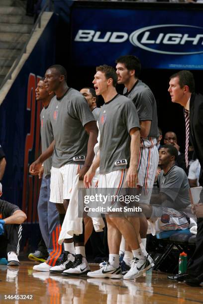 The Charlotte Bobcats cheer for their team from the sidelines during the game between the Charlotte Bobcats and the New York Knicks at the Time...