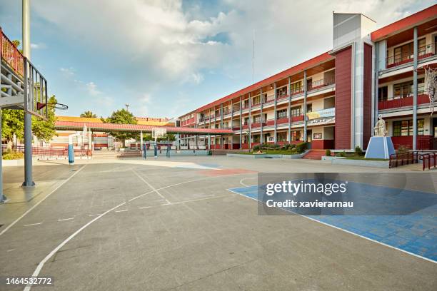 unoccupied outdoor playground, elementary campus - skolgård bildbanksfoton och bilder