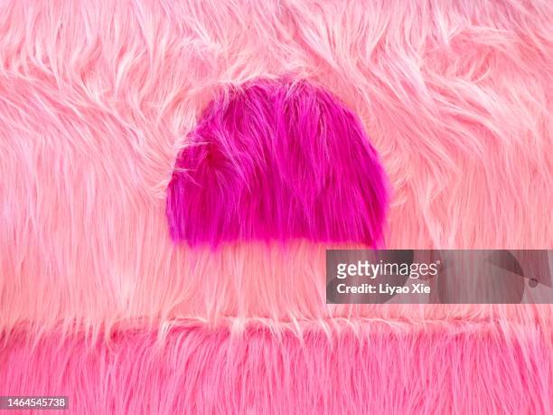 pink fur - ruffled hair stock pictures, royalty-free photos & images