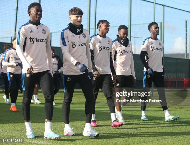 Kobbie Mainoo, Alejandro Garnacho, Noam Emeran, Anthony Elanga, Bjorn Hardley of Manchester United in action during a first team training session at...