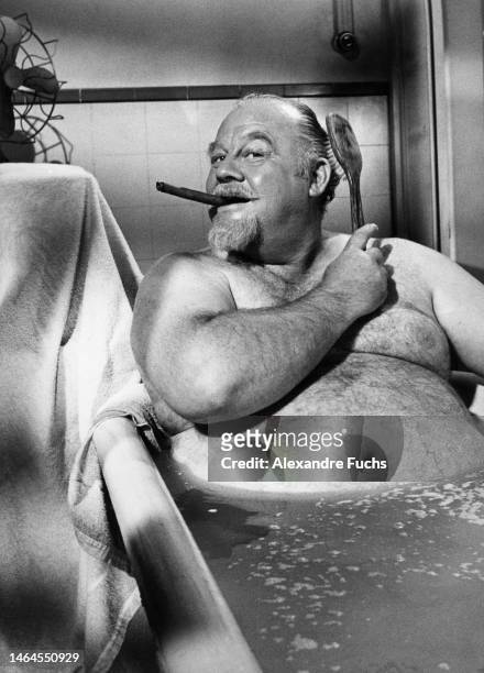 Actor Burl Ives takes a bath in a scene of the movie "The Spiral Road", in 1961 at Paramaribo, Suriname