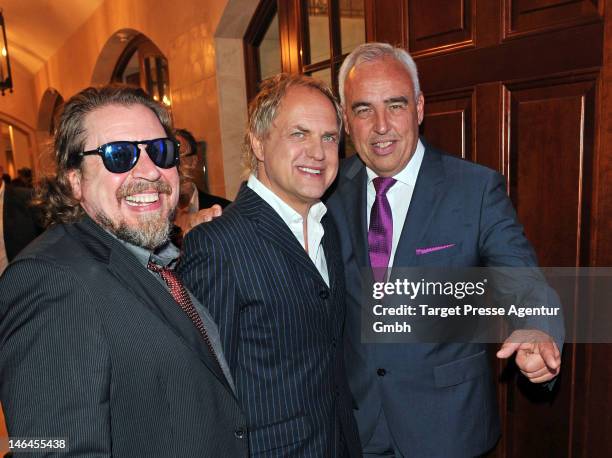 Armin Rohde, Uwe Ochsenknecht and Hans-Reiner Schroeder attend the cocktail reception of the 'BMW Golf Cup 2012' at Hotel Adlon on June 16, 2012 in...