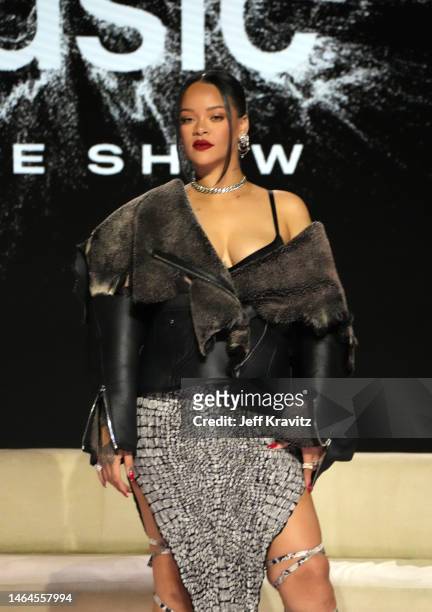 Rihanna speaks onstage during the press conference for Apple Music Super Bowl LVII Halftime Show at Phoenix Convention Center on February 09, 2023 in...