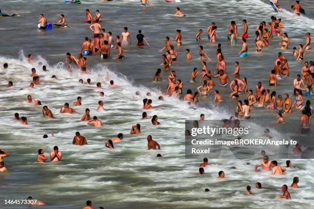 view from above of anonymous crowd in the surf, tourists swimming in the sea, enjoying cooling off, fun in summer, illustration, biarritz, france - biarritz surf stock illustrations