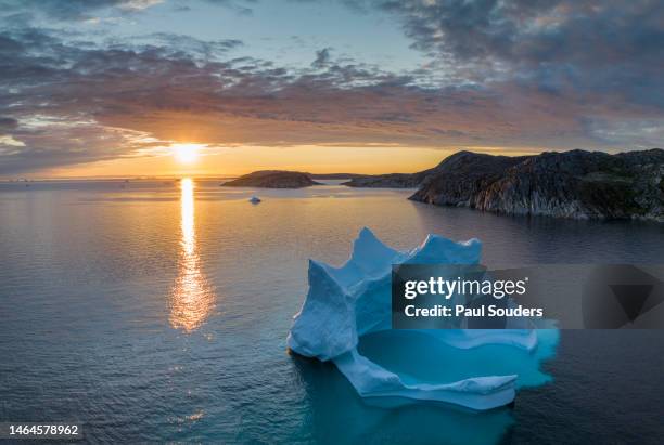 aerial view sunset and melting glacial iceberg in disko bay, greenland - ilimanaq stock pictures, royalty-free photos & images