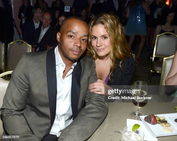 Actor Donald Faison and Cacee Cobb attend the 100th anniversary celebration of the Beverly Hills Hotel & Bungalows supporting the Motion Picture &...