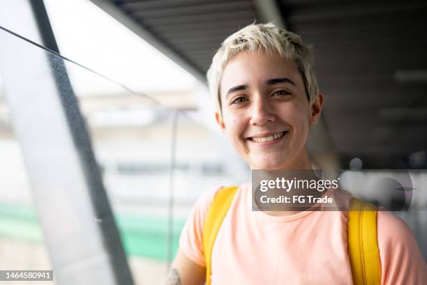 portrait of a young woman in the subway station - alternative lifestyle stock pictures, royalty-free photos & images