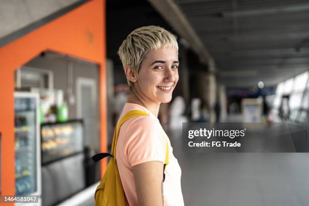 portrait of a young woman in the subway station - brazilian shorthair stock pictures, royalty-free photos & images