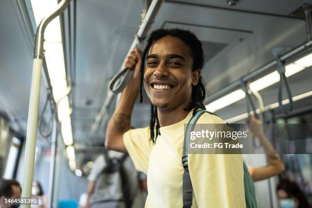 portrait of a young man in the train - brazil cable car stock pictures, royalty-free photos & images