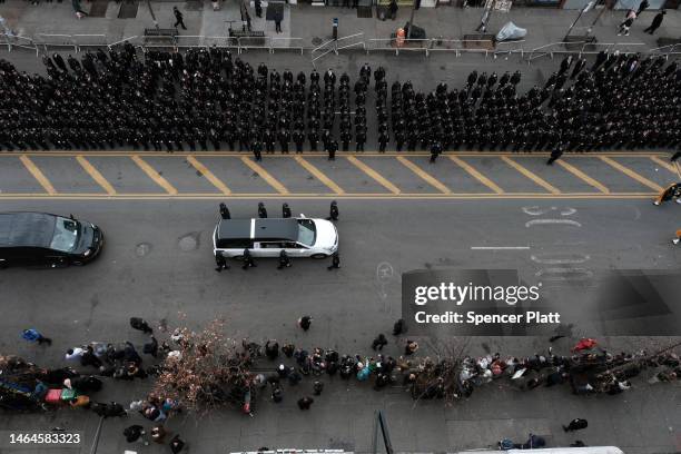 The hearse carrying the body of NYPD police officer Adeed Fayaz leaves a mosque on Coney Island Avenue following his funeral service on February 09,...