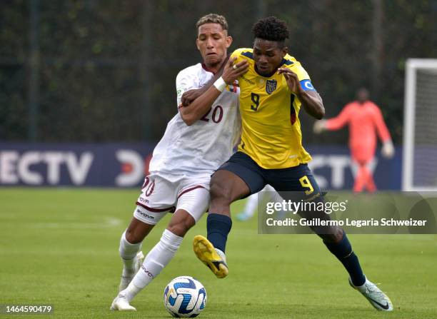 Andres Romero of Venezuela fights for the ball with Justin Cuero of Ecuador during a South American U20 Championship match between Venezuela and...