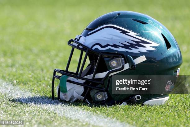 Detailed view of a Philadelphia Eagles helmet lays on the field in a practice session prior to Super Bowl LVII at Arizona Cardinals Training Center...