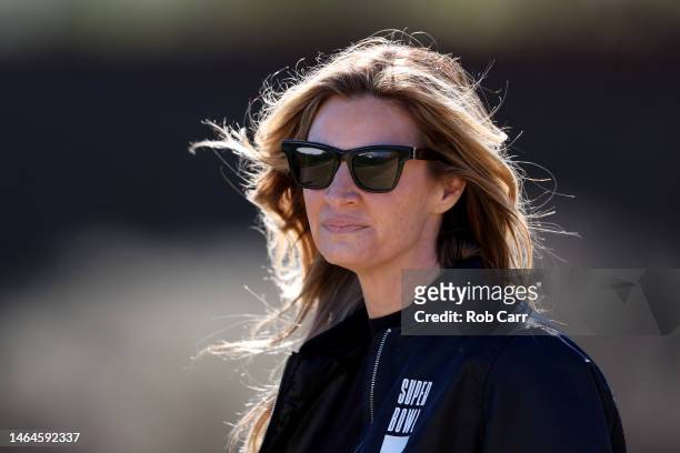Sportscaster Erin Andrews watches a practice session for the Philadelphia Eagles prior to Super Bowl LVII at Arizona Cardinals Training Center on...