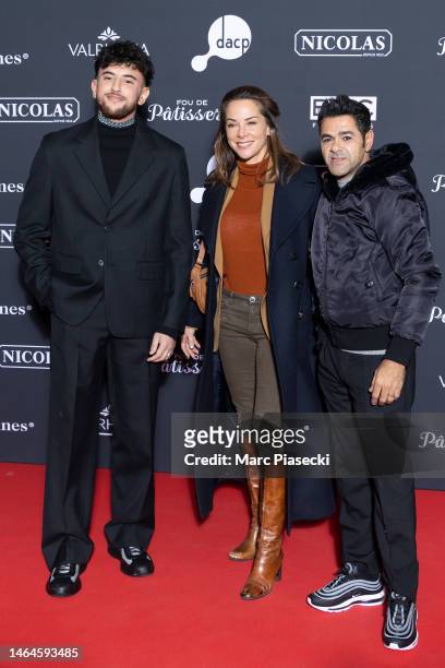 Riadh Belaiche, Melissa Theuriau and Jamel Debbouze attend the "A La Belle Etoile" Premiere At Le Grand Rex on February 09, 2023 in Paris, France.