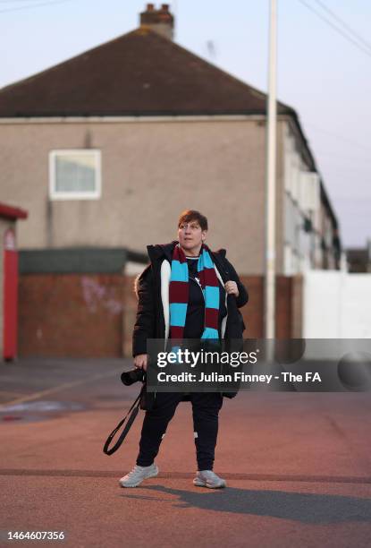 Fan arrives before the FA Women's Continental Tyres League Cup Semi Final match between West Ham United Women and Chelsea Women at Chigwell...