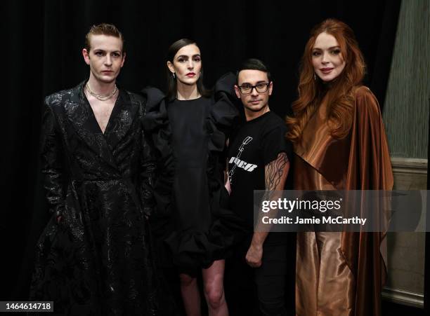 Dakota Lohan, Ali Lohan, Christian Siriano and Lindsay Lohan attend the Christian Siriano Fall/Winter 2023 NYFW Show at Gotham Hall on February 09,...