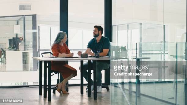 coaching, mentor and planning with. business people in meeting for consulting, idea and review. partnership, goal and strategy with employee in office building for feedback, leadership and management - feedback imagens e fotografias de stock