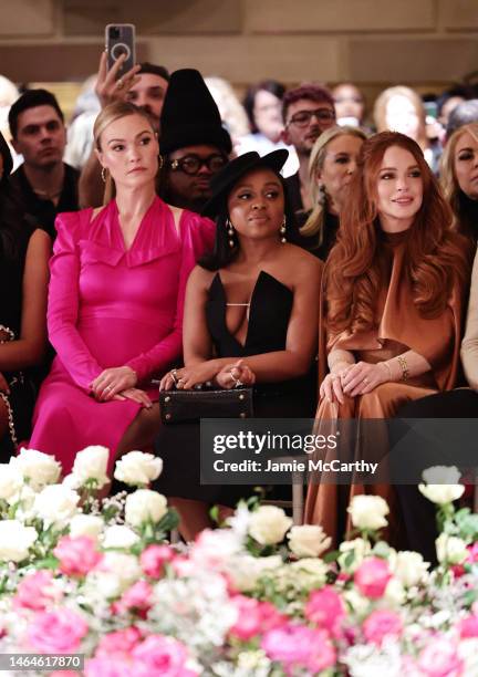 Julia Stiles, Quinta Brunson and Lindsay Lohan sit front row at the Christian Siriano Fall/Winter 2023 NYFW Show at Gotham Hall on February 09, 2023...