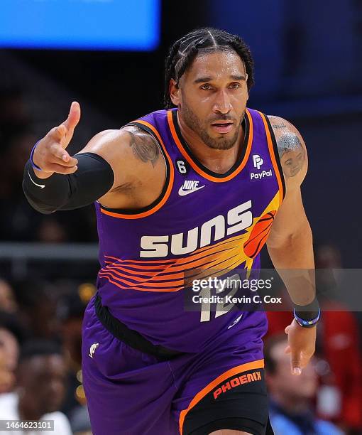 Ish Wainright of the Phoenix Suns reacts after hitting a three-point basket against the Atlanta Hawks during the second quarter at State Farm Arena...