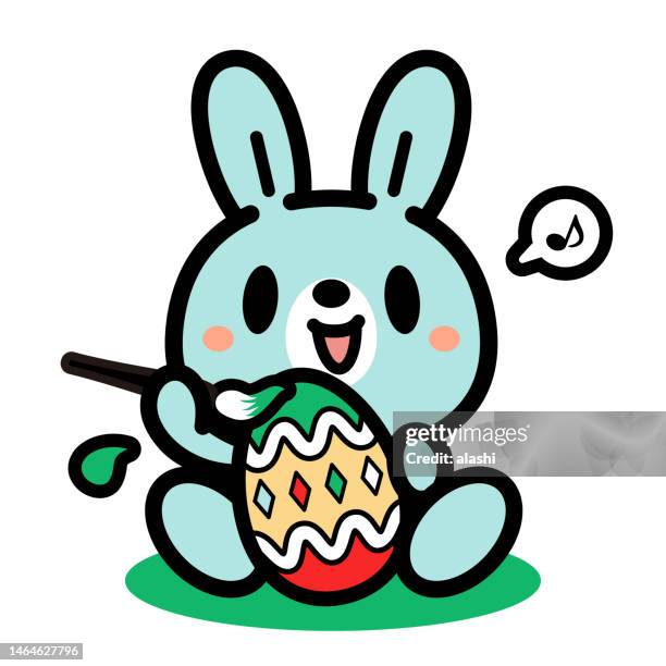 a cute easter bunny artist painting an easter egg - baby rabbit stock illustrations