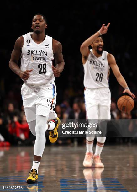 Spencer Dinwiddie of the Brooklyn Nets controls the ball as Dorian Finney-Smith jogs upcourt during the game against the Chicago Bulls at Barclays...