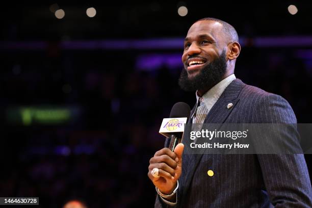 LeBron James of the Los Angeles Lakers speaks as he is honored in a ceremony as the NBA's all-time leading scorer, surpassing Kareem Abdul-Jabbar's...