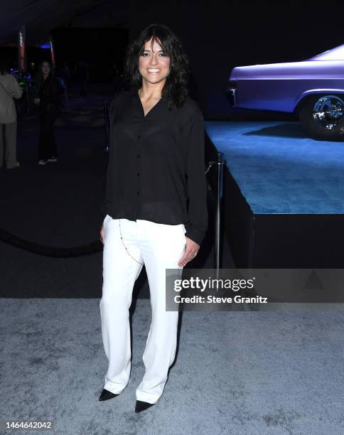 Michelle Rodriguez arrives at the Trailer Launch Of Universal Pictures' "Fast X" at Regal LA Live on February 09, 2023 in Los Angeles, California.