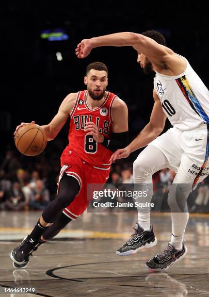 Zach LaVine of the Chicago Bulls drives to the basket as Ben Simmons of the Brooklyn Nets defends during the game at Barclays Center on February 09,...